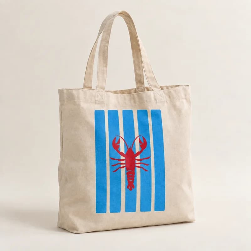 Tote bag « Homard en marinière » — photographie réaliste du produit personnalisé